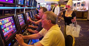 Hacksaw Gaming live-dealer studio with multi-camera setup and dealer interface